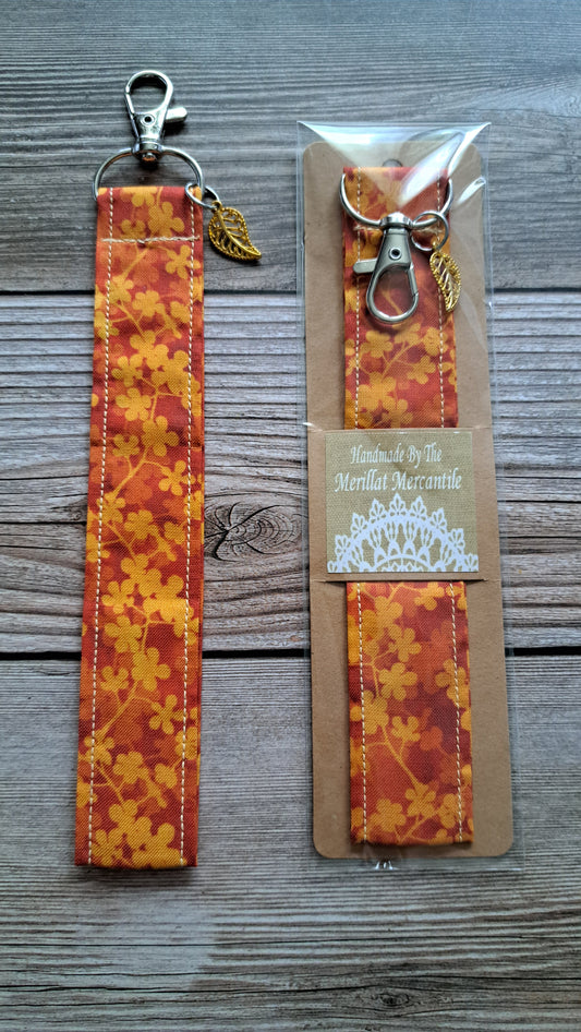 Orange Floral Vine Fabric Key Strap with Golden Leaf Charm